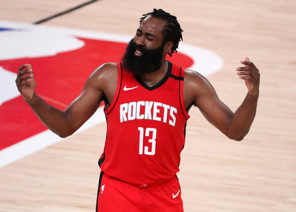 Disgruntled all-star James Harden showed up late to the Houston Rockets training camp after asking to be traded to a contender