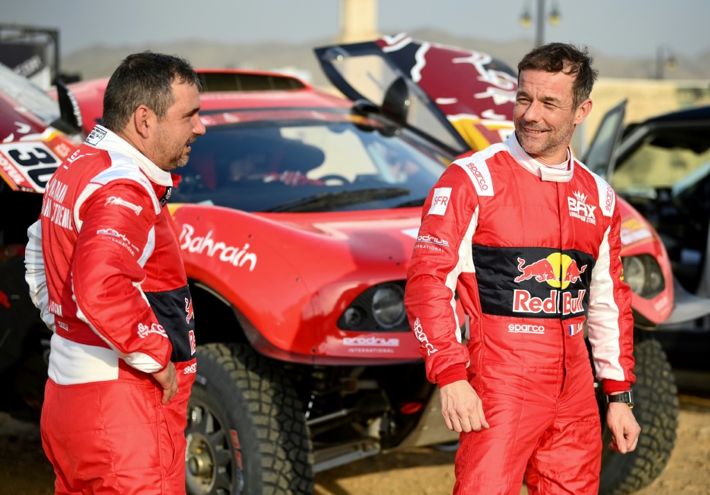 Sébastien Loeb (d) et son copilote Daniel Elena à Djeddah