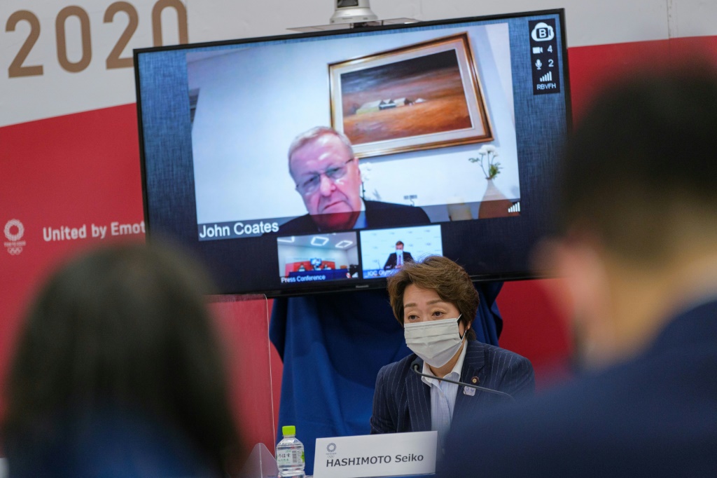 John Coates (sur écran) lors d'une réunion de coordination des JO en présence notamment de la présidente Seiko Hashimoto