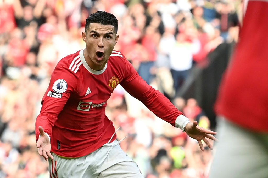 La joie du Portugais Cristiano Ronaldo, après avoir inscrit son 3e but à domicile, lors de la victoire de Manchester United, 3-2 face à Norwich, lors de la 33e journée de Premier League, le 16 avril 2022 au Stade d'Old Trafford