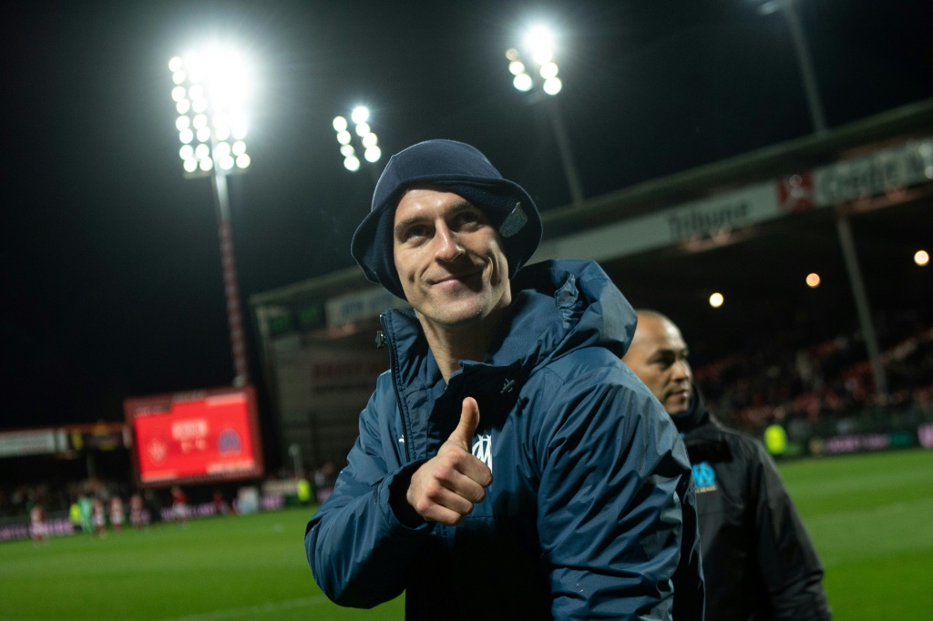 La joie de l'attaquant polonais Arkadiusz Milik, après la victoire de Marseille, 4-1 face à Brest, lors de la 28e journée de Ligue 1, le 13 mars 2022 au Stade Francis Le Blé