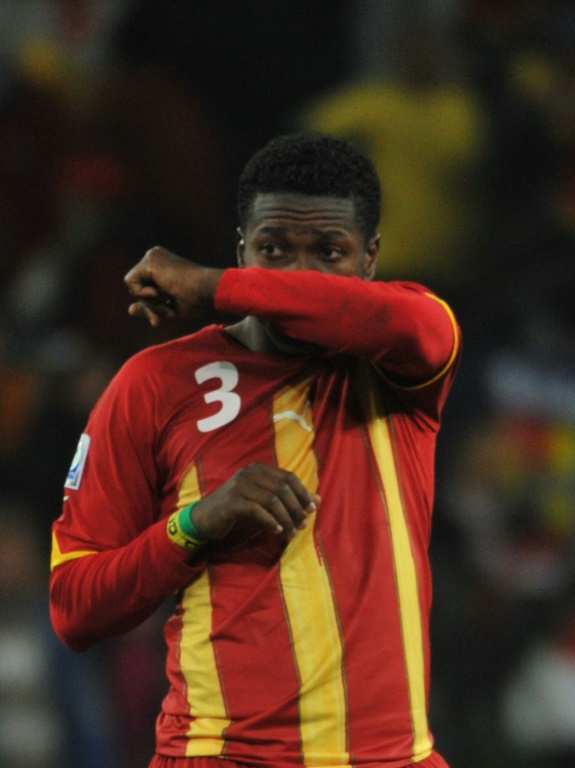La tristesse de l'attaquant du Ghana Asamoah Gyan lors de l'élimination de son pays par l'Uruguay en quart de finale du Mondial-2010 en Afrique du Sud, le 2 juillet 2010 à Johannesburg