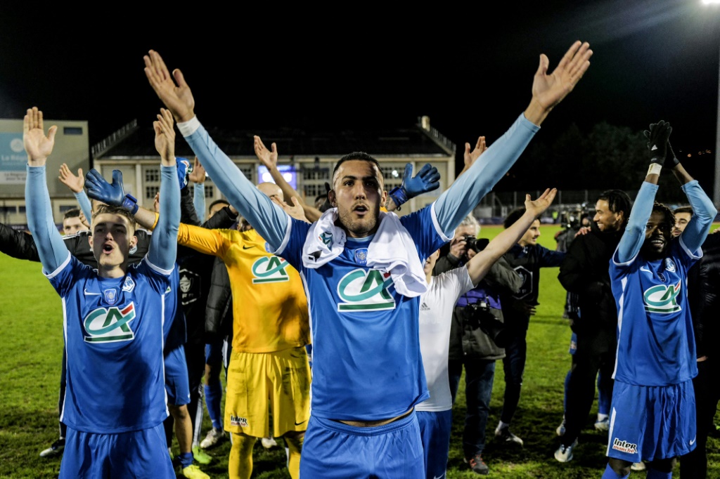 La joie des joueurs du Puy, tombeurs de Nice, finaliste de la Coupe de France 2022, le 7 janvier 2023 au Puy-en-Velay