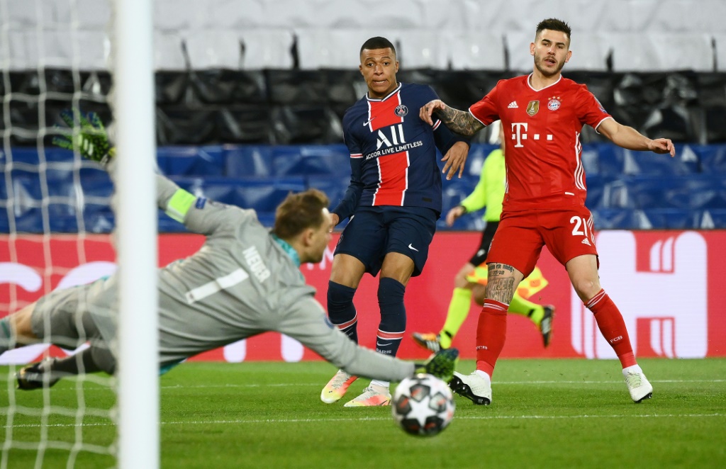 Kylian Mbappe inscrit un but pour le Paris SG contre le Bayern Munich lors d'un quart de finale de la Ligue des champions, le 13 avril 2021 à Munich